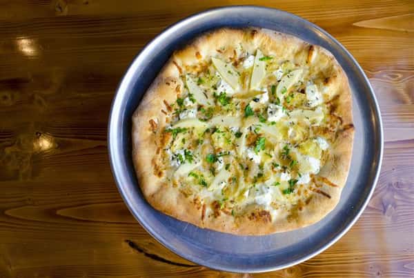The Bee's Knees. White Sauce, House Blend Cheese, Brie, Goat Cheese, Asiago, Roasted Apples, Sweet Onion, Rosemary, Honey.
