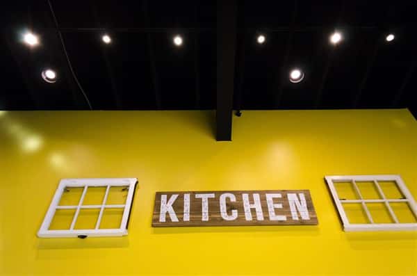 Kitchen sign on interior wall
