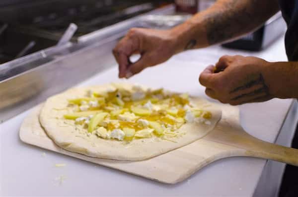 PIzza maker making pie