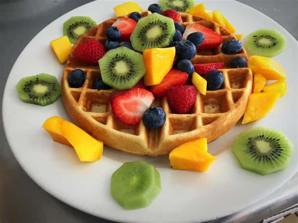 waffle topped with various fruit