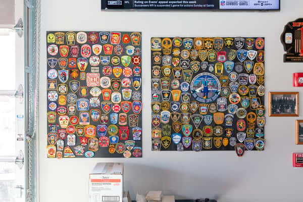 wall of badges and patches