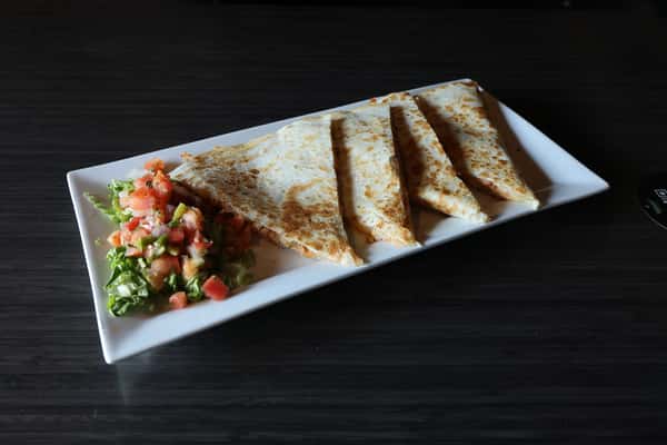 Grilled Quesadilla Served with Fresh Pico de Gallo