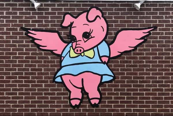 Pig with wings sign