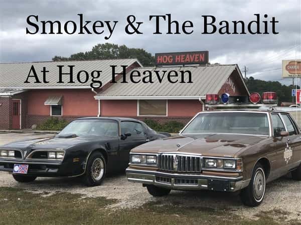 Two cars "Smokey and the Band at Hog Heaven"