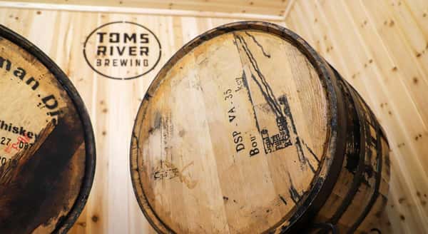 Wooden barrel with Toms River Brewing Logo