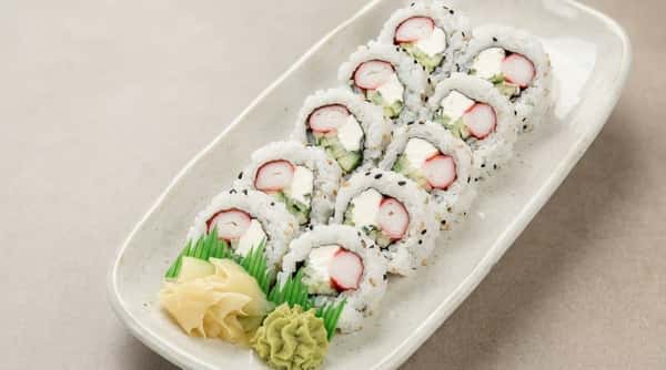 California sushi rolls with crab, cucumber, and avocado served with wasabi and pickled ginger