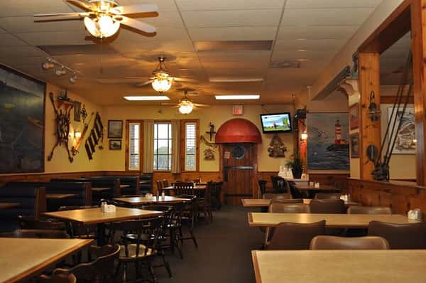 Dining area with fans hanging above