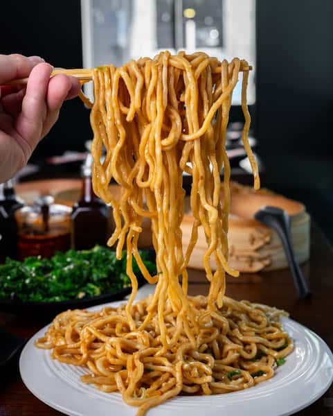 Our creamy garlic noodles are a crowd favorite! Swing by to see what all the buzz is about 😋