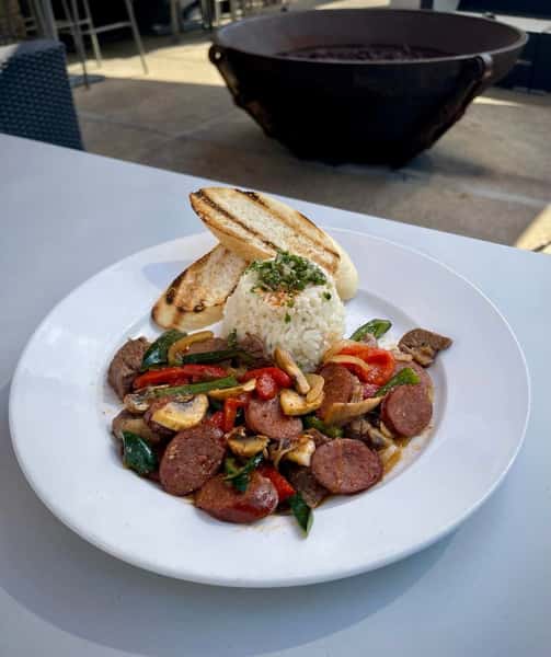 Steak & Sausage Saltado w: vermouth herb butter and chimichurri