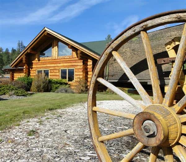 closeup of large wooden wagon wheel