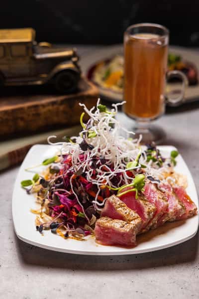 Fedora Fin - Za'atar Crusted Ahi, Crispy Taro Root, Puffed Rice Noodle, Pickled Slaw, Soy Truffle Vinaigrette