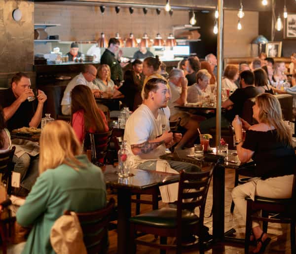 Date night with couples seated at Prohibition