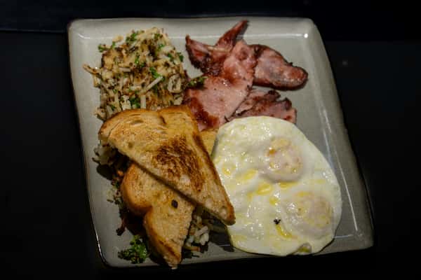 eggs and meat with bread