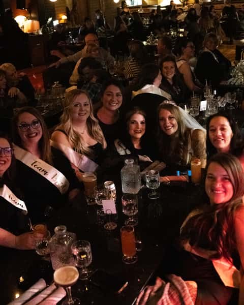 Group celebration at Prohibition speakeasy restaurant in Murray Utah