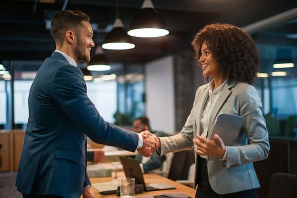 Man and woman shaking hands