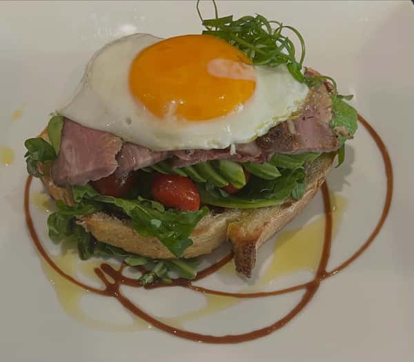 Breakfast just got a whole new look with our take on Steak and Eggs! Our smoked trip tip, sunny side up egg, fresh avocado, blistered tomatoes over arugula on our toasted San Joaquin sourdough drizzled with balsamic glaze is great to start your day right! Or have it for lunch with our strawberry lemonade! We serve breakfast all day! #sourdough #avocadotoast #tritip