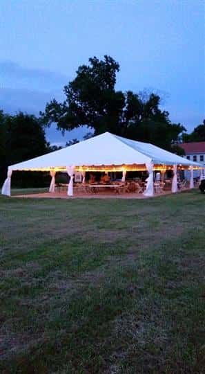 a tent outdoors with lights