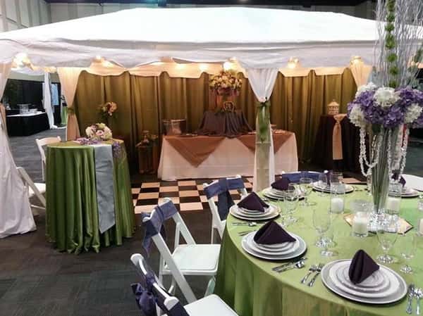 Our display booth at the 2014 bridal expo. 10x20 tent and dance floor tables