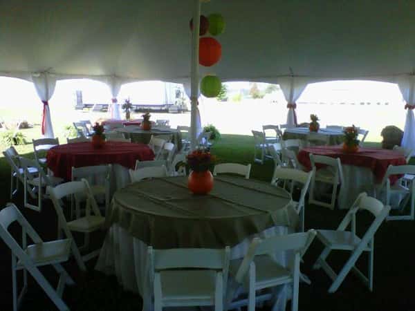 a view from under a big tent and another one in the background