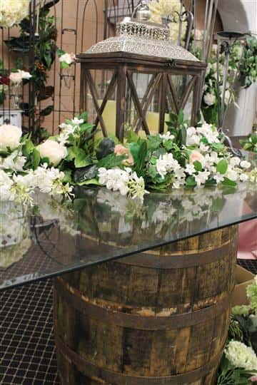 glass tables with floral vines