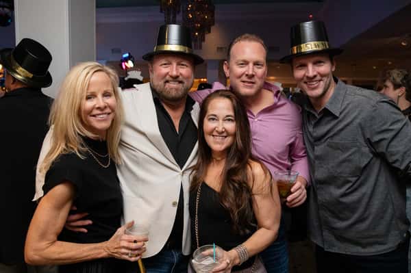 Group posing for photo at Bluewater NYE Party