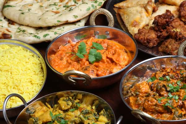 A variety of Indian dishes on a table
