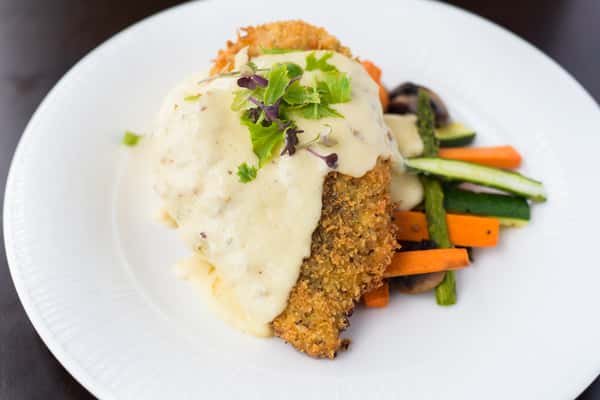 Herb Crusted Chicken with Parmesan Cream and Loaded Potato Puff