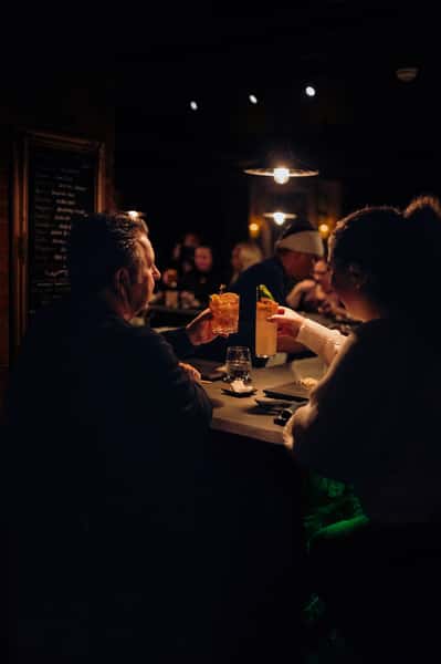 Friends enjoying food and drinks