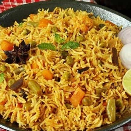 Vegetable Biryani w/ Raita & Curry Sauce (vegan)