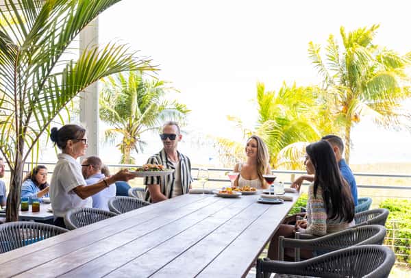 Friends join for dinner at Oceanic