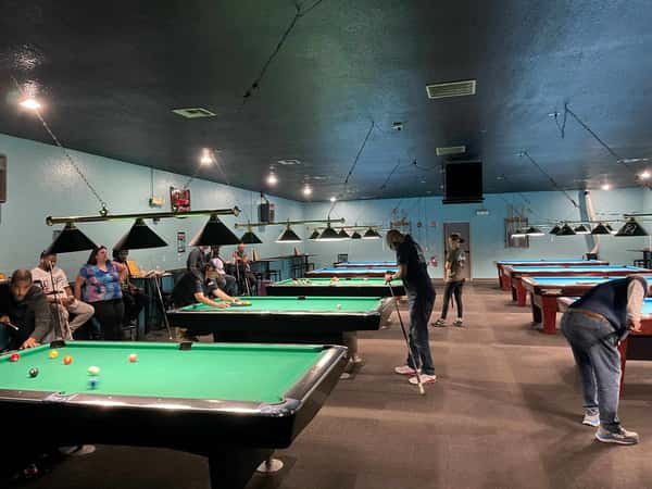 Pool tables with players
