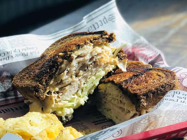 Turkey, Swiss cheese, house made slaw, Russian dressing, rye bread
