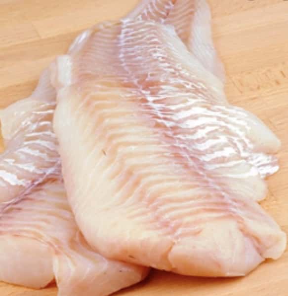 pices of fish on a cutting board