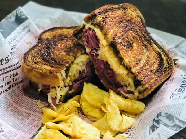 Corned beef, Swiss cheese, kraut, Russian dressing, rye bread