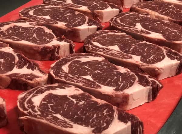 assortment of raw meats