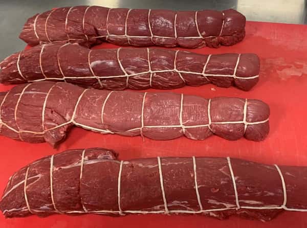 assortment of meat tied