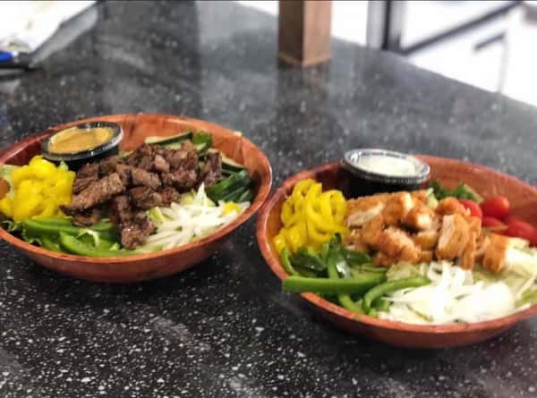 grilled steak salad and crispy chicken salad