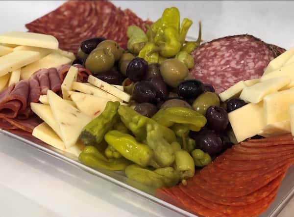 meat and cheese platter with olives