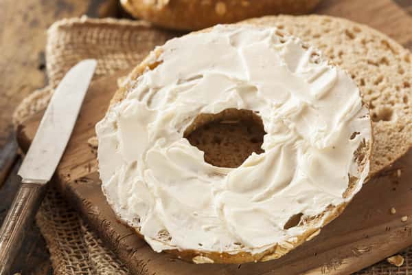 bagel with cream cheese on top