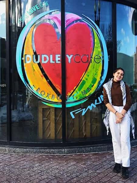 Sofia in front of Dudley Cafe