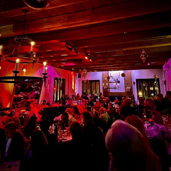 photo of crowed lounge room taken last new year's eve 2026