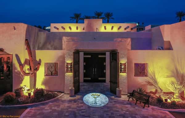photo front entrance of building double 14" doors entrance to restaurant