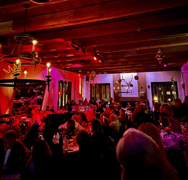 photo of crowed lounge room taken last new year's eve 2026