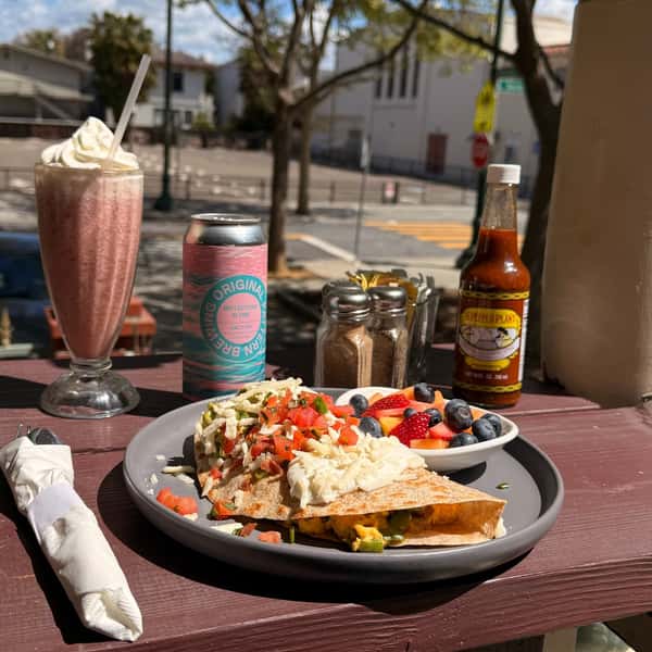 Food and drinks on a patio table