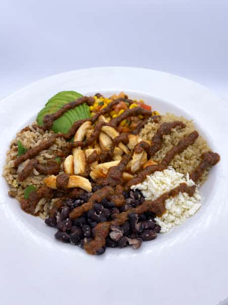 Plate of food with a drizzled sauce