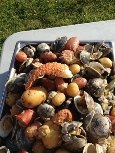 a lobster boil of shrimp, potatoes, cla,s, mussels and rice