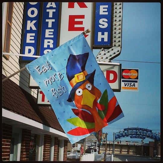 a flag of a turkey that says "Eat more fish"