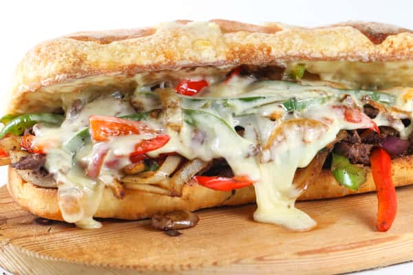 * Sautéed Mushroom CheeseSteak, Or CheeseyChicken with your choice of American, Swiss, Cheddar, Feta, or Provolone