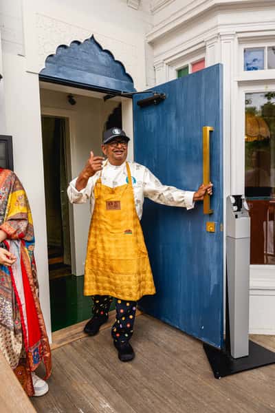 chef welcoming guests