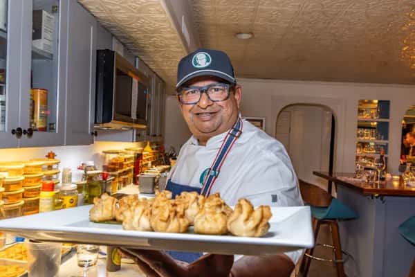 chef holding dish